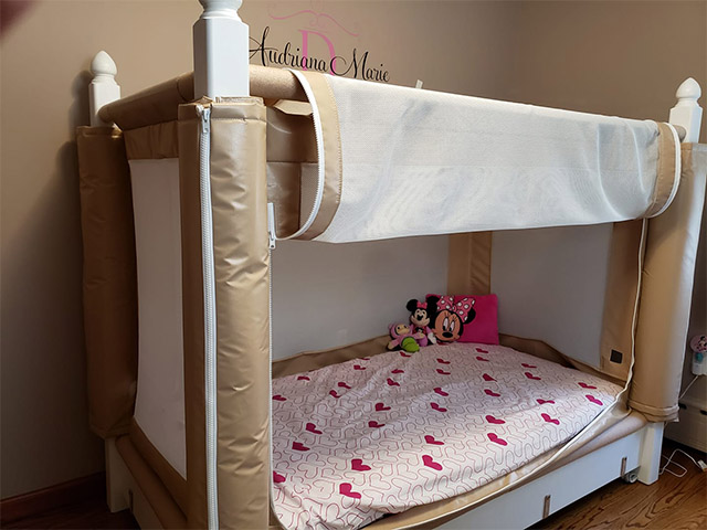 The Noah's World bed shown with custom bedding